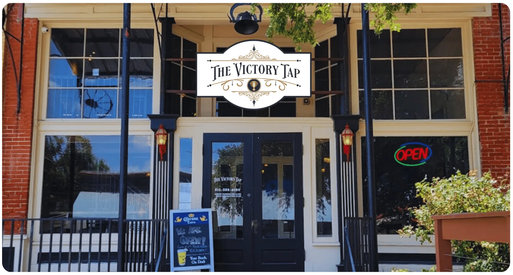The Victory Tap’s actual storefront and entrance at 111 East Main Street.